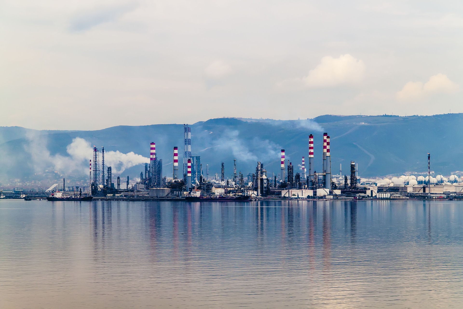 Refinery with emissions impacting the environment